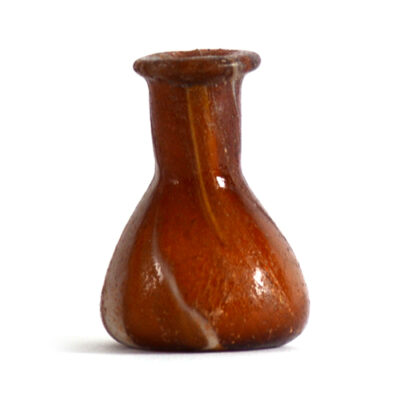 A Roman brown glass unguentarium, 1st-2nd century AD